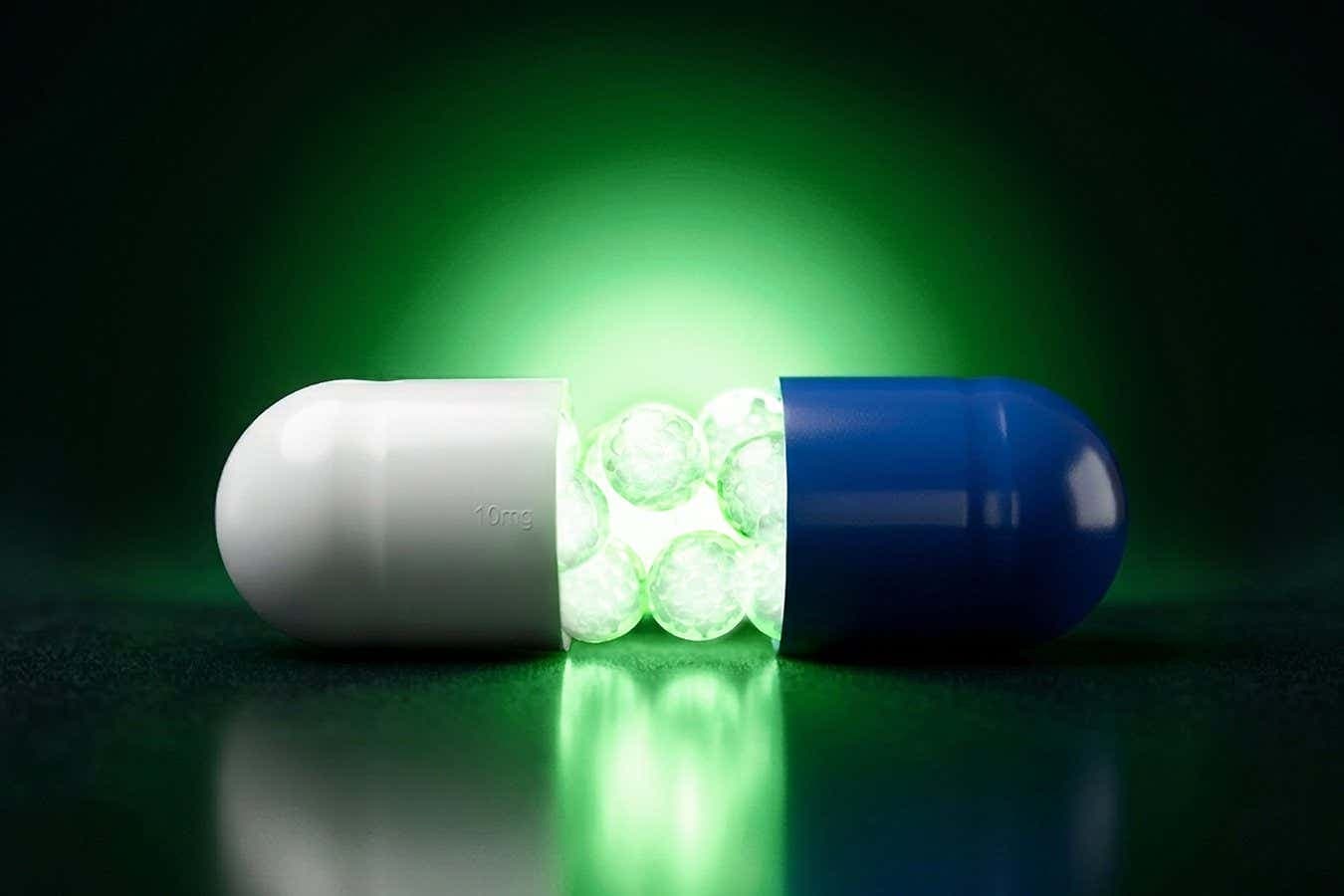 A pill capsule with glowing green contents