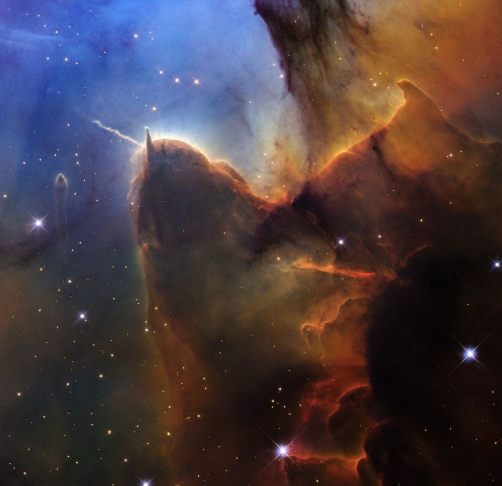 This Hubble image shows part of the Trifid Nebula, an object the space telescope first observed in 1997. This image is part of NASA's celebration for the telescope's 35th year of work. The central part of the image looks almost like a sea slug with its pair of antennae. Image Credit: NASA, ESA, STScI; Image Processing: Joseph DePasquale (STScI)