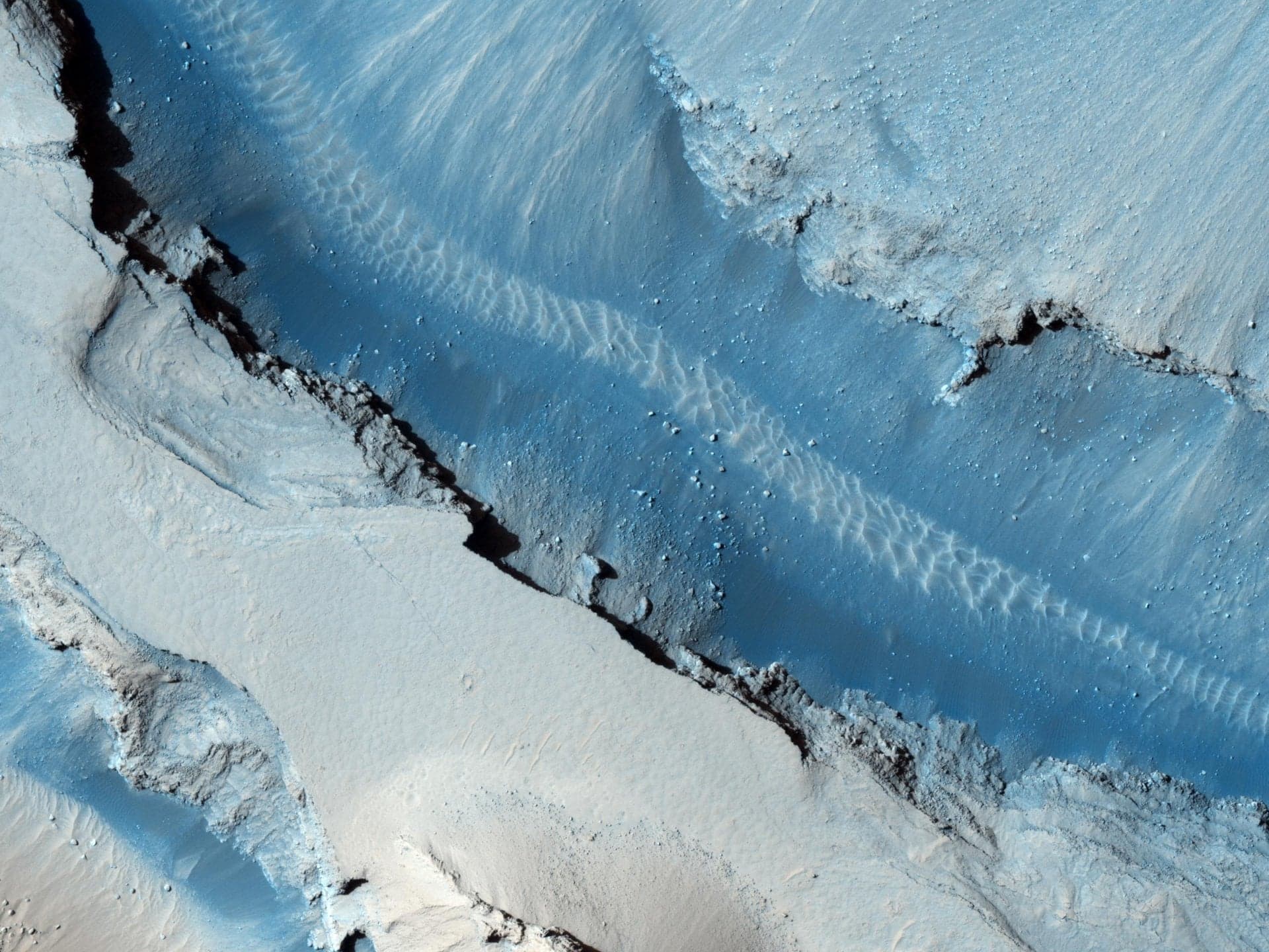 Image of part of Cerberus Fossae near the Athabasca Valles takes by the Mars Reconnaissance Orbiter. Credit - NASA / JPL-Caltech / University of Arizona