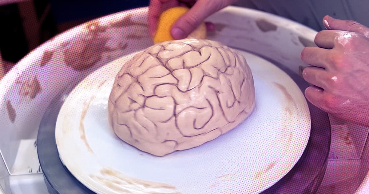 A clay brain spins on a pottery wheel.