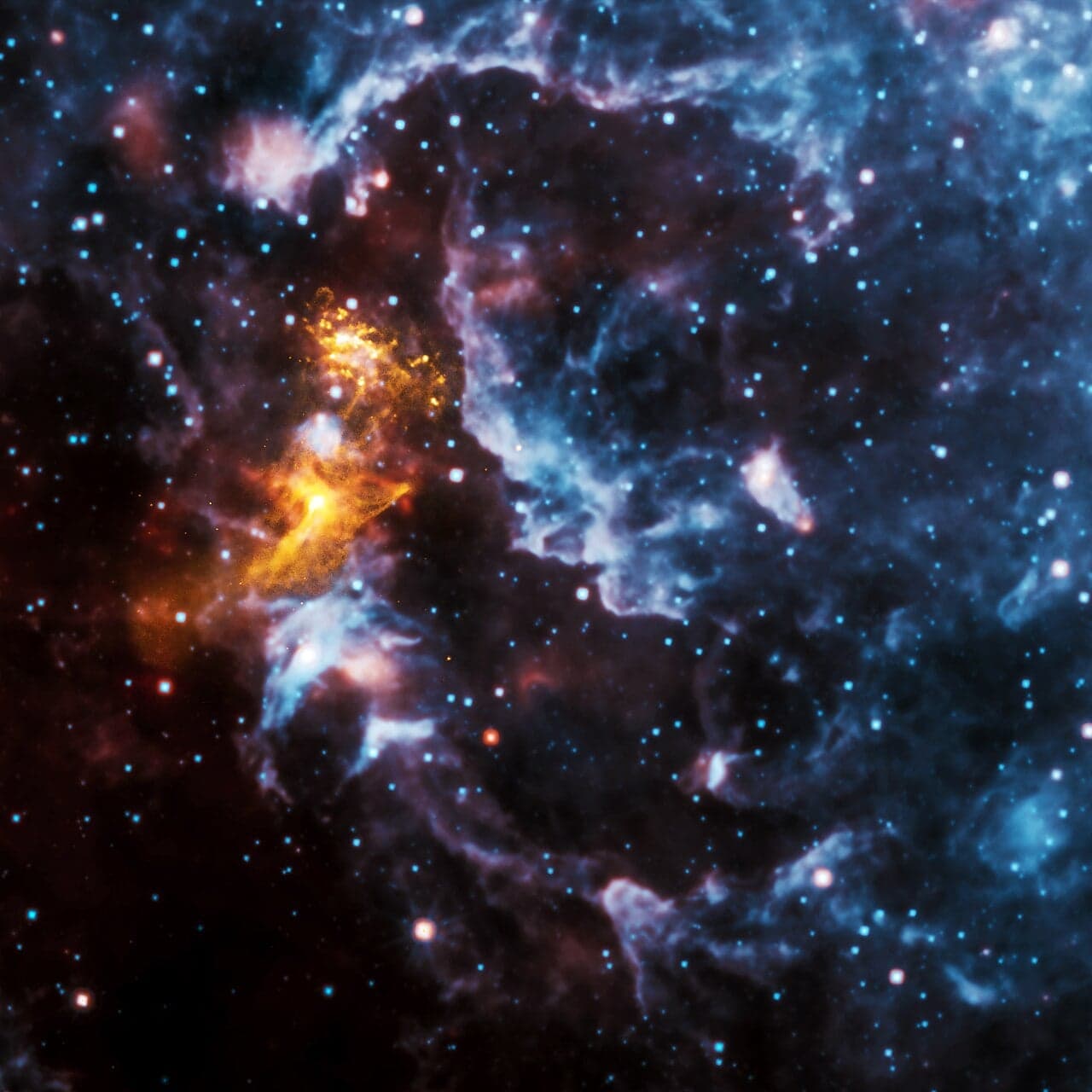 A pulsar, known as PSR B1509−58 lies at the heart of this nebula. X-rays from Chandra are gold; infrared from WISE in red, green and blue (Credit : NASA/CXC/SAO (X-Ray); NASA/JPL-Caltech (Infrared))